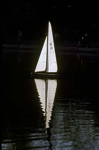 Sailboat with halo caused by extreme contrast